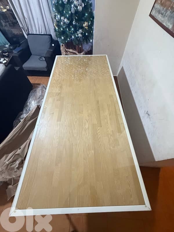 modern dining table with 6 matching chairs, in excellent condition. 3