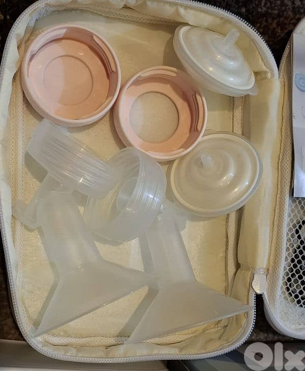 SPECTRA 9 PLUS electric breast pump- like new/4$ delivery 4