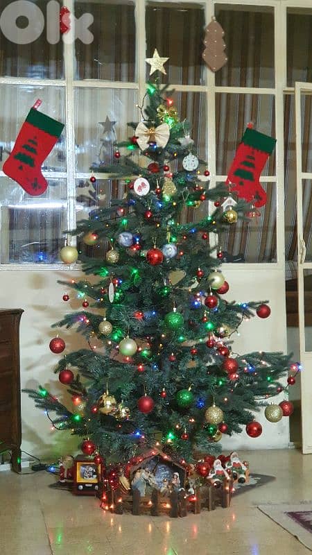 شجرة  الميلاد  مع  زينة  وأغراض ميلاد (بداعي السفر ) بيروت  ٠٣٧٢٣٨٩٥ 2