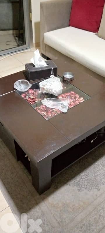 3 sofas and a table 3