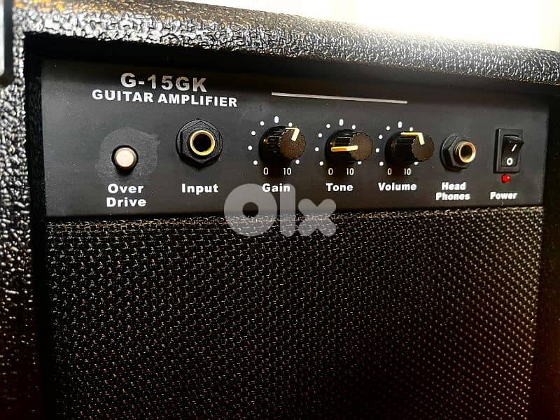 Electric Guitar + Amplifier + Case and Jack cable 4