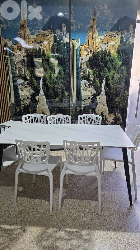 ceramic table with chairs. طاولة سيراميك مع ٦ كراسي 3