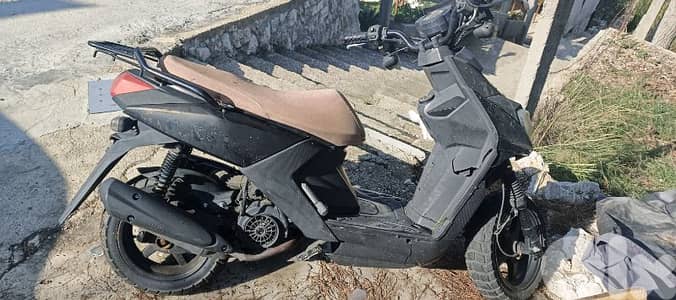 moto lal be3 200$ bala wra2