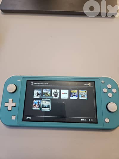 Nintendo Switch Lite with 5 games and Free Cover