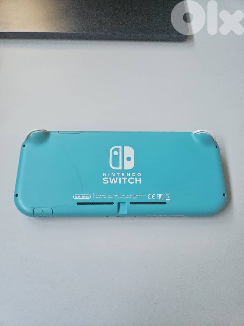 Nintendo Switch Lite with 5 games and Free Cover 2