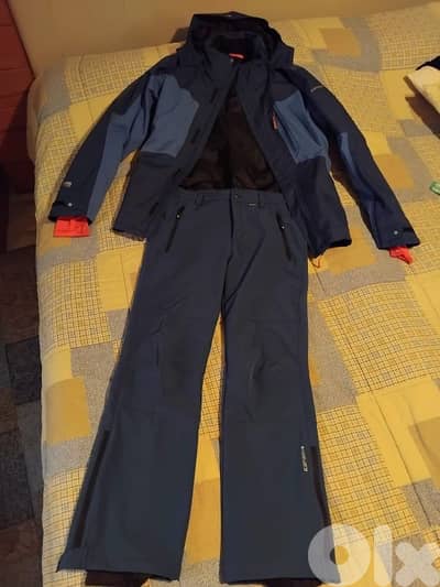 Skiing costume with helmet age 14-16 size M
