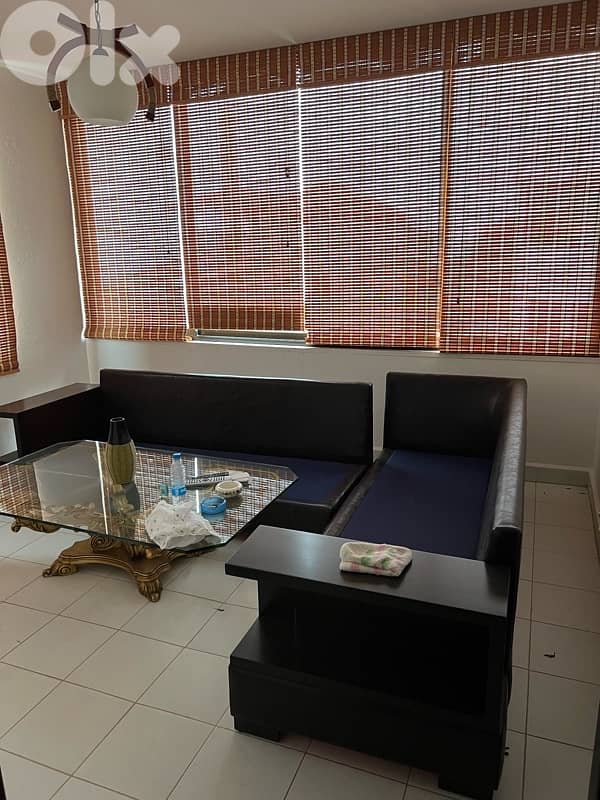 l-shape sofa WITH CUSHIONS and coffee table 1