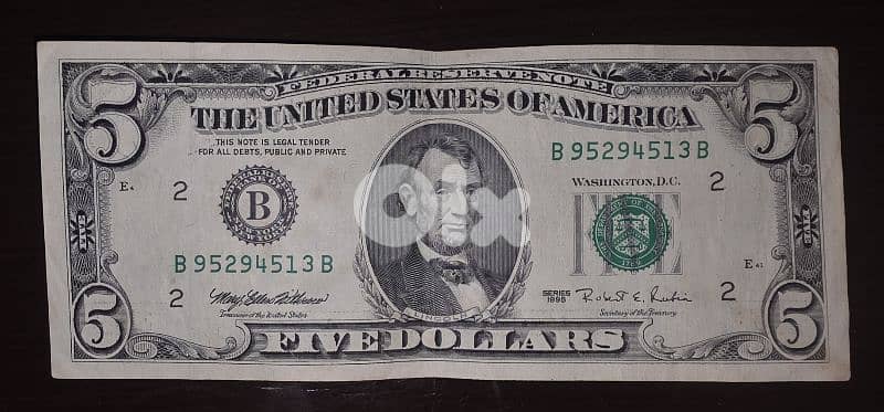 set of old dollar ($) bills. 2, 5, 20 6