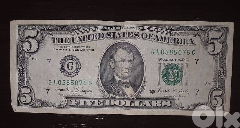 set of old dollar ($) bills. 2, 5, 20 8