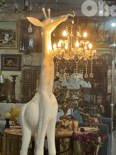 vintage white giraffe lighting holder