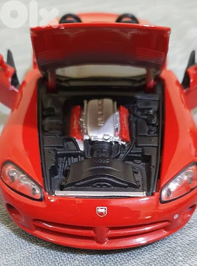 Red Dodge Viper  iron used like new no scratches  1/24   only 12 $