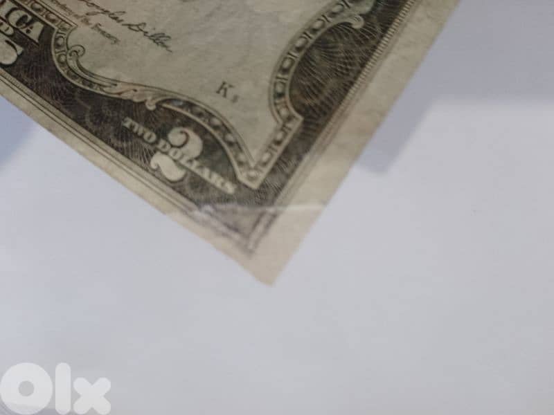 2 دولار اصدار 1953 فيها ترميم زغير على الزاوية الايمن السفلي 2