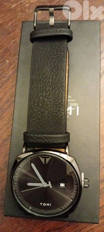 ساعة tomi copy a صيني بطارية جديدة