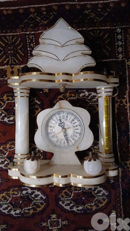 ساعه صخريه ماشيه تمام 1