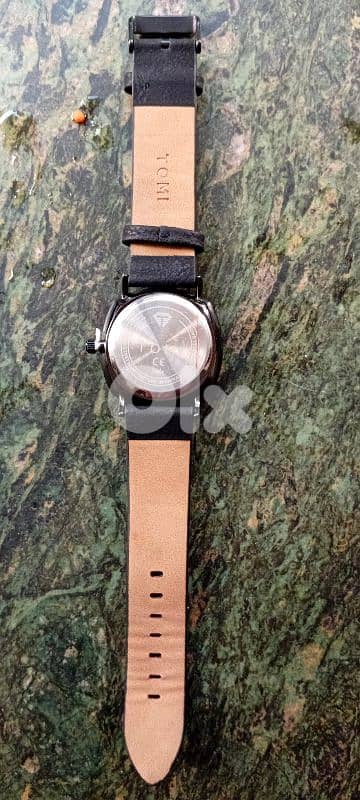 ساعة tomi copy a صيني بطارية جديدة 5