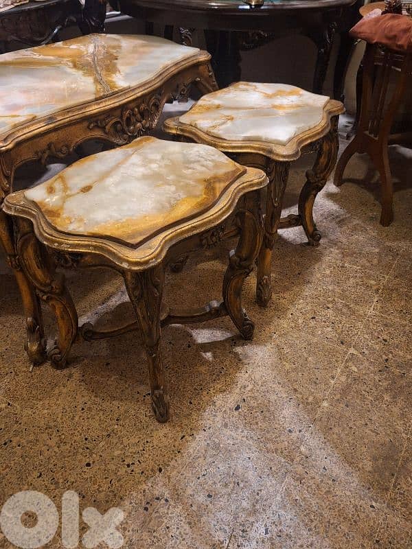 3 tables set wood and marble on top 1