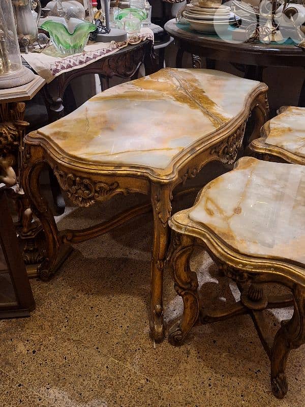 3 tables set wood and marble on top 2