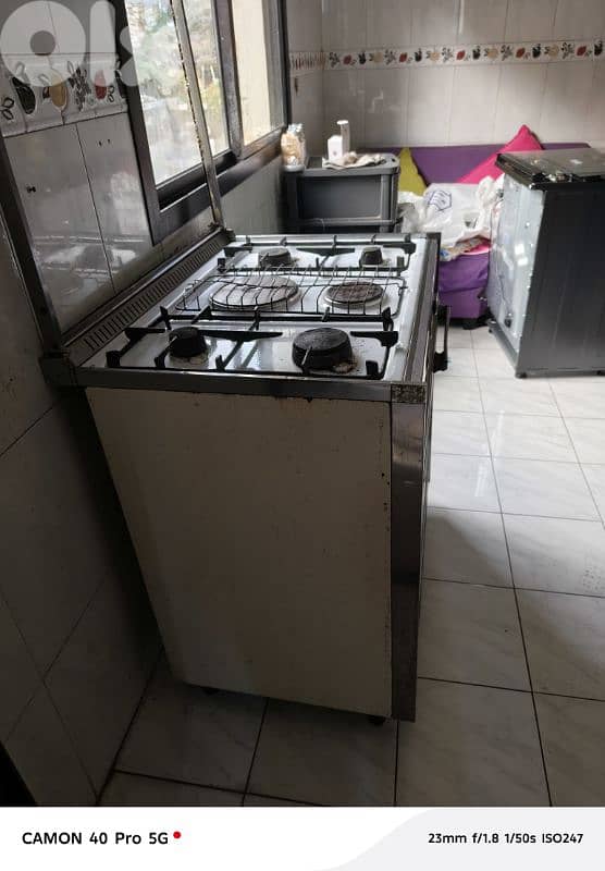 غاز ايطالي 6عيون ٢ كهرباء ٤غاز مع فرن كبير و شواية فروج كهرباء 2