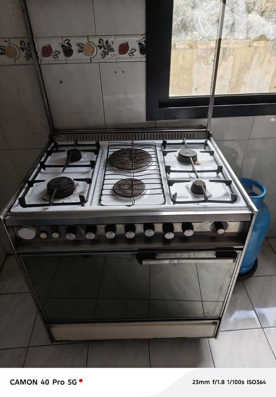 غاز ايطالي 6عيون ٢ كهرباء ٤غاز مع فرن كبير و شواية فروج كهرباء 4