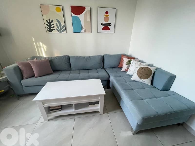 Table that opens to become closer to seat 2