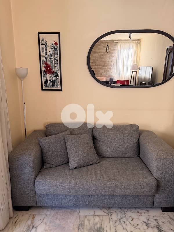 grey L shape couch with coffee table  اوضة قعدة رمادي مع طاولة وسط 3