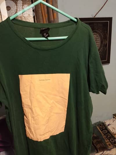 H&M green T-shirt.