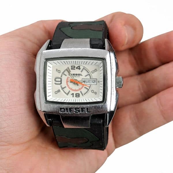 Diesel,  DZ-1216.  Quartz (battery-operated). stainless steel. 10 BAR 1