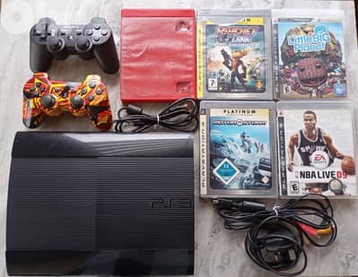 PS3 console + two controllers + 5 games