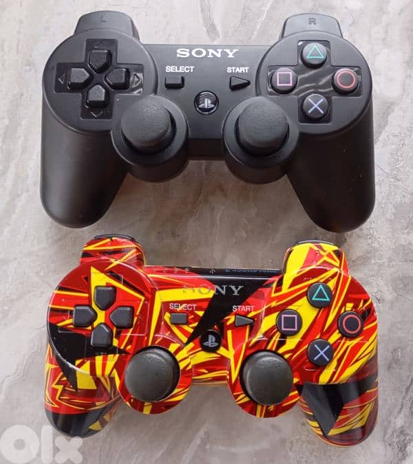 PS3 console + two controllers + 5 games 2