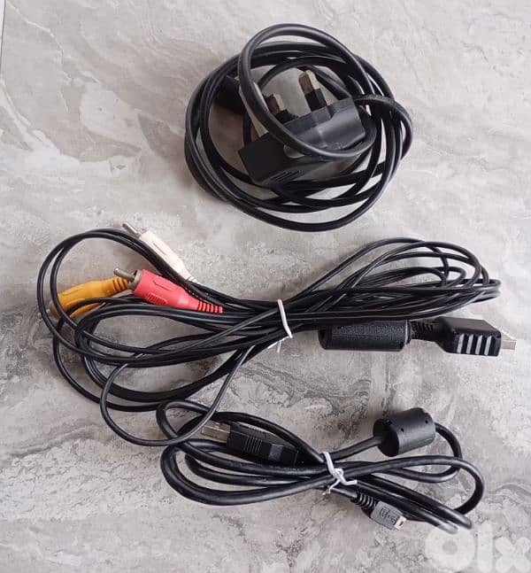 PS3 console + two controllers + 5 games 3