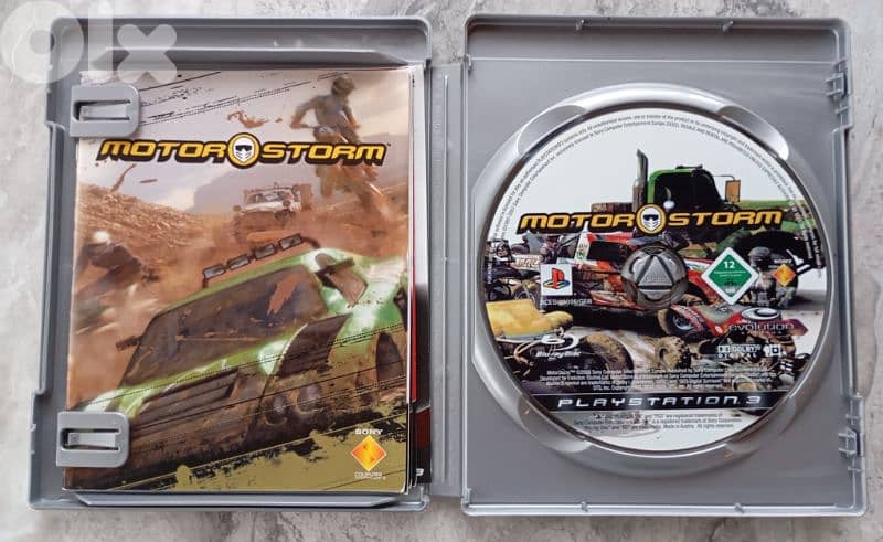 PS3 console + two controllers + 5 games 6