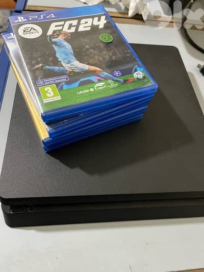 PS4 slim (500gb) with 4 CDs