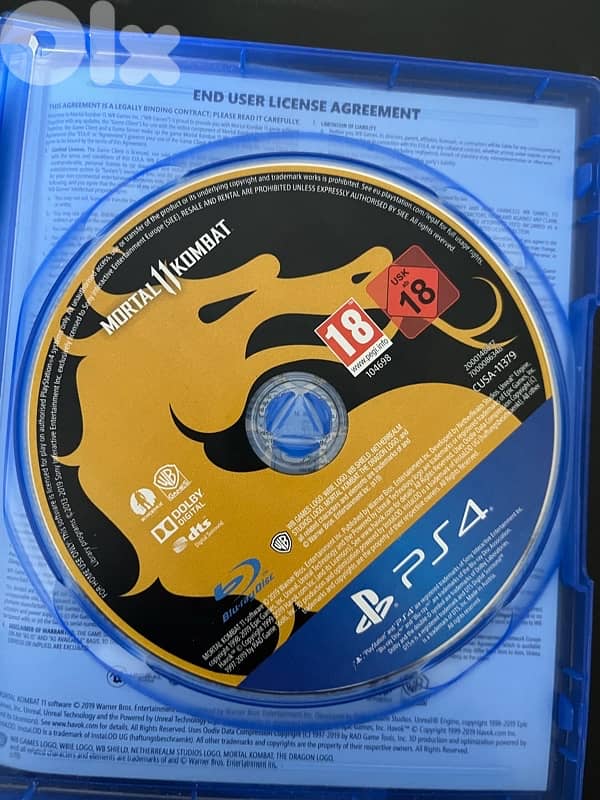 PS4 slim (500gb) with 4 CDs 3