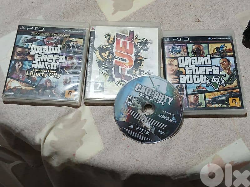 ps3 slim with 2 game fuel and  call of duty 3