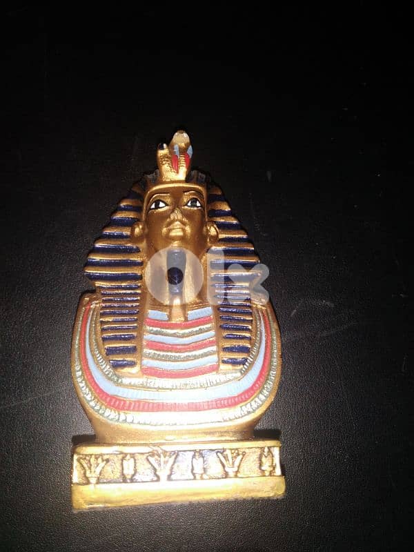 status of the mask of Pharaoh ((inportad)) 4