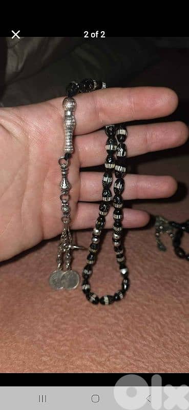 مسبحة يسر مطعمة فضة و صدف