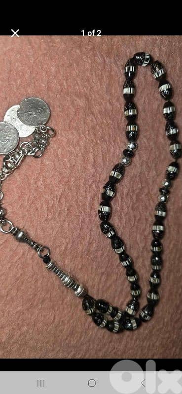 مسبحة يسر مطعمة فضة و صدف 1