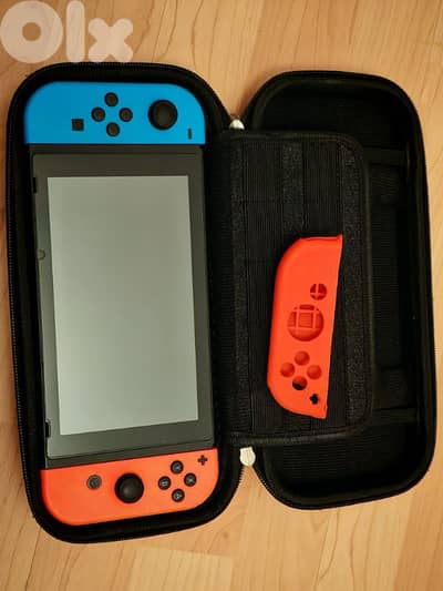 Nintendo Switch + pouch and sleeve and screen protector
