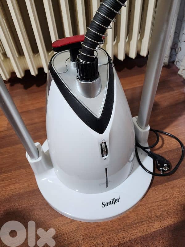 Steam ironing machine 2