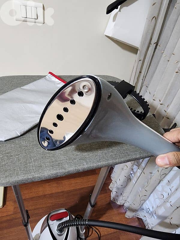 Steam ironing machine 3