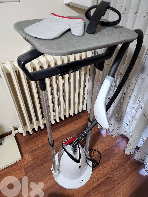 Steam ironing machine 5