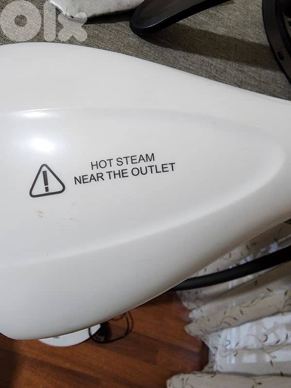 Steam ironing machine 6