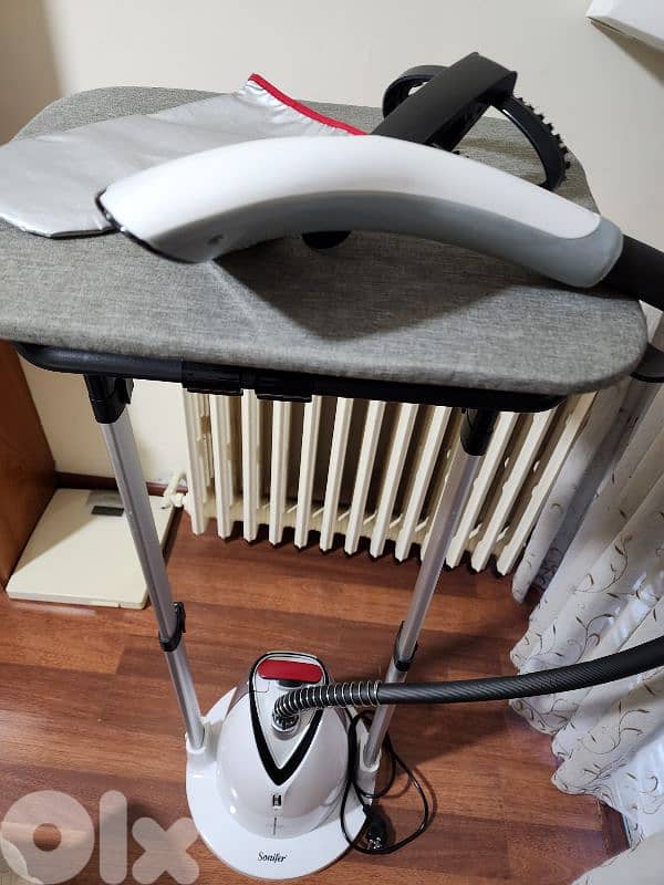 Steam ironing machine 7
