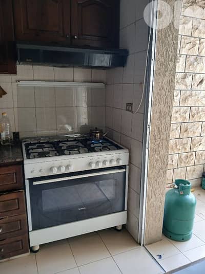 gas oven seimens 90 com with hood and gas bottle