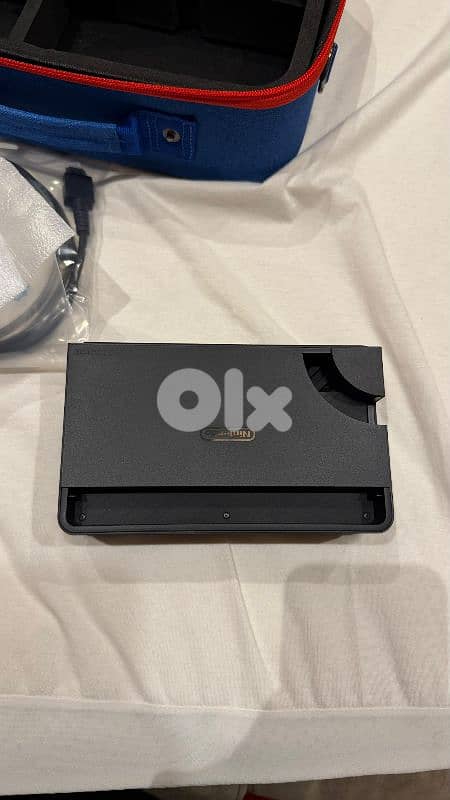 Nintendo Switch OLED + 2 Games + Box + Cases – Excellent Condition 2