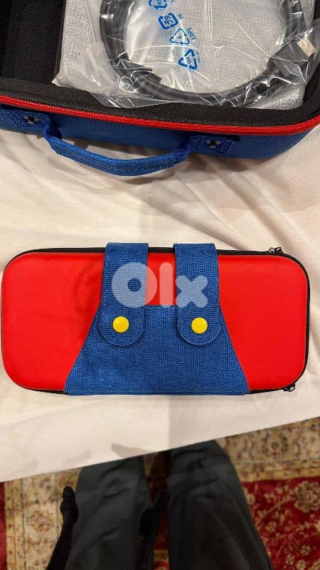 Nintendo Switch OLED + 2 Games + Box + Cases – Excellent Condition 8