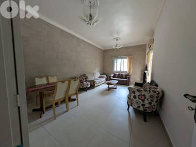 abd aziz  street   near  auh or AUBMC