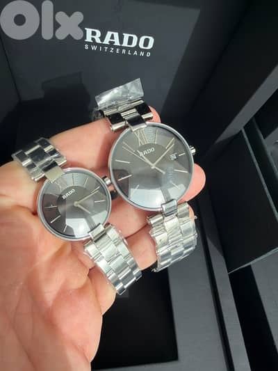 2 Rado Coupole stainless steel watch with a black dial
