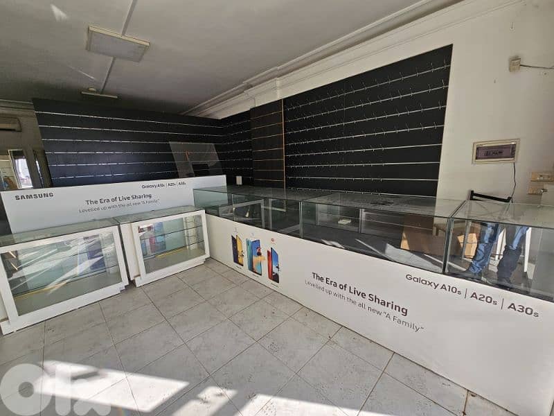 ديكور محل واجهات وكونتوار 2