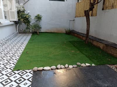 Furnished apartment for rent in Hazmieh with terrace and garden.